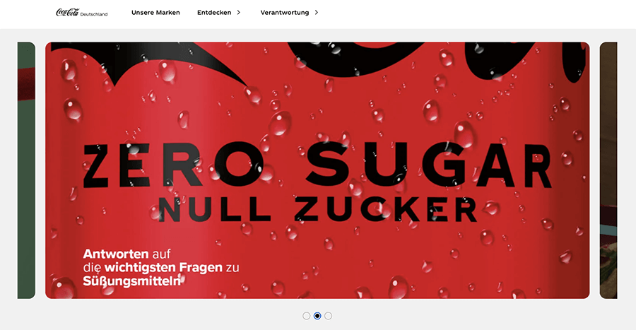 das deutliche rote Corporate-Design von coca cola auf der webseite